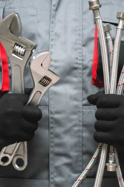 A person holding tools.